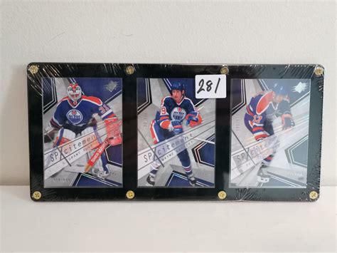 Grant Fuhr, Wayne Gretzky, and Jari Kurri hockey cards - Schmalz Auctions