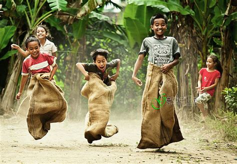 Doing a sack race with friends. Photograph by I Gede Lila Kantiana on ...