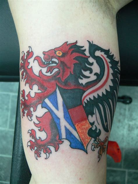 Scotland tattoo lion with flag on arm - Tattooimages.biz