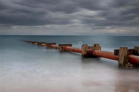 Scenic View of the Blyth Beach Pipes in Northumberland on a Cloudy Day Stock Photo - Image of ...