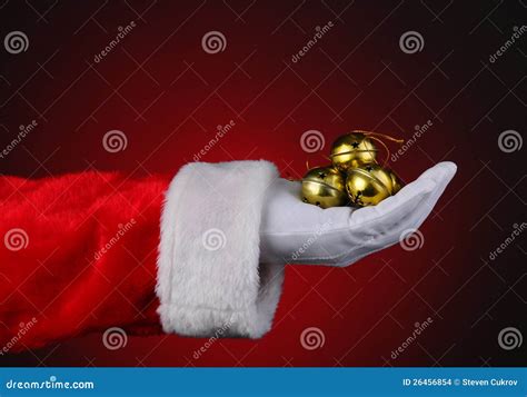 Santa With Handful Of Sleigh Bells Stock Images - Image: 26456854