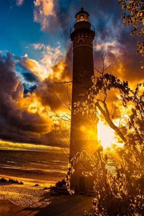 Lighthouse at Sunset near Silver Lake, Michigan - | Lighthouse pictures, Beautiful lighthouse ...