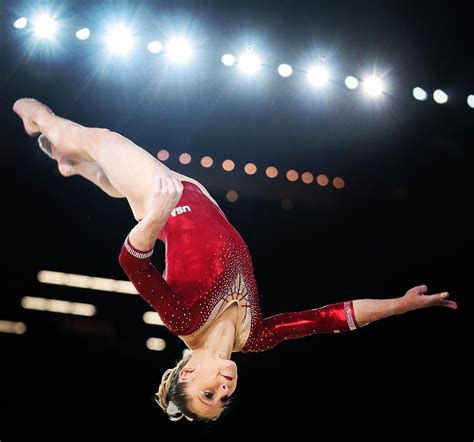 Ragan Smith flies through the air during her floor routine during the ...