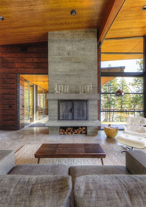 Modern log cabin perched on a cliff overlooking Coeur D’Alene Lake ...