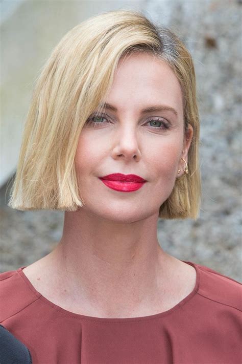 Charlize Theron's AIDS Activism Began With Rushing Patients to Hospitals with Her Mom