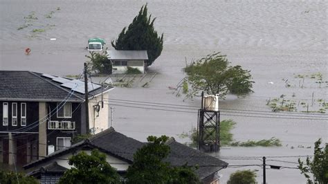 Typhoon Lashes Japan with Torrential Rain and Strong Winds on a Slow ...