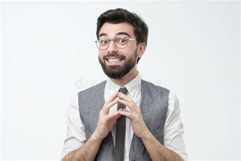 Shy Young Hispanic Man Asking for a Favor or Help Smiling. Studio Shot ...