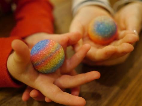 Lola and Ava show off some of the balls we made