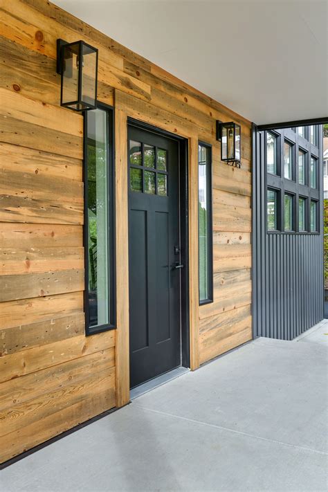 Reclaimed wood entrance with accents | Wood siding exterior, Exterior ...