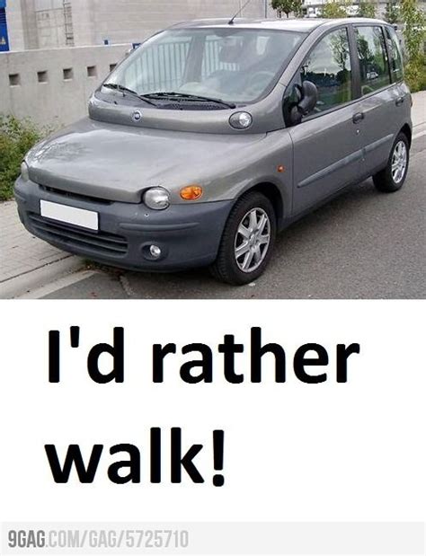 a car is parked on the side of the road and it says, i'd rather walk