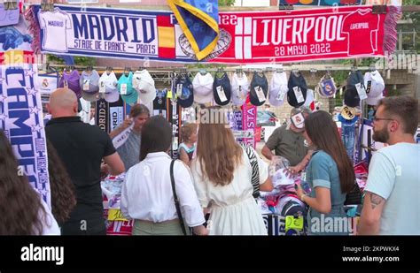 Real Madrid fans purchase souvenirs outside the Santiago Bernabeu ...