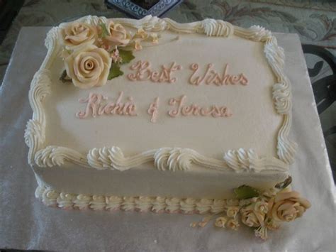 sheet cake for a small family wedding dinner. Last minute order so I used some pre-made flowers ...