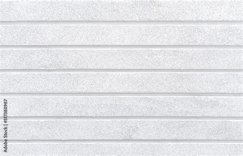 White cement wall texture with horizontal panels. House exterior walls design. Stock Photo ...