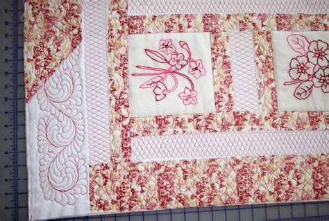 A quilt with some red work blocks - Quiltingboard Forums