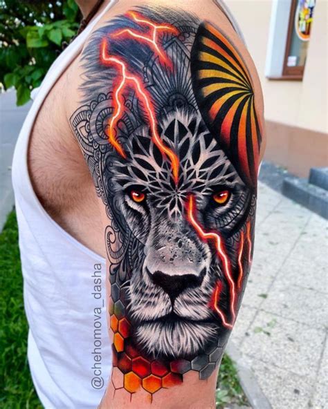 Tatouage Tête de Lion avec éclairs colorés sur épaule | Cool chest tattoos, Lion tattoo ...