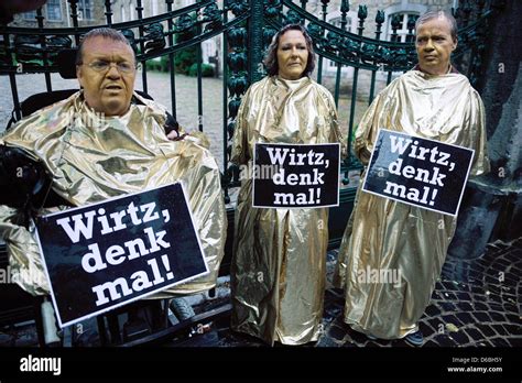 Opponents of the monument for victims of the medication Contergan stand in front of Gruenenthal ...