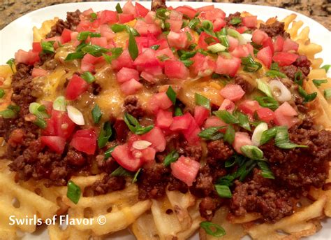 Cheesy Chili Smothered Waffle Fries - Swirls of Flavor