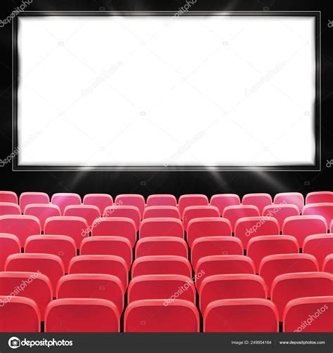 Rows of red cinema or theater seats in front of black blank screen. Wide empty movie theater ...