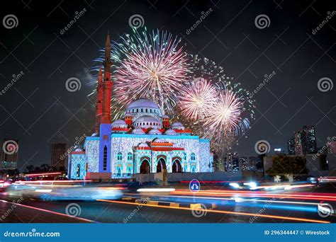 Stunning Sharjah Mosque Illuminated at Night by the Fireworks Stock ...