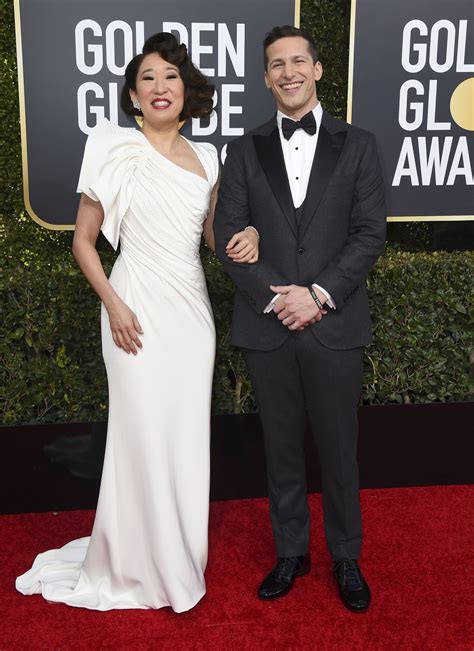 SANDRA OH and Andy Samberg at 2019 Golden Globe Awards in Beverly Hills ...