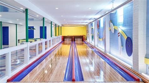 An Interior Designer Drastically Transformed This Bellport, Long Island Bowling Alley ...