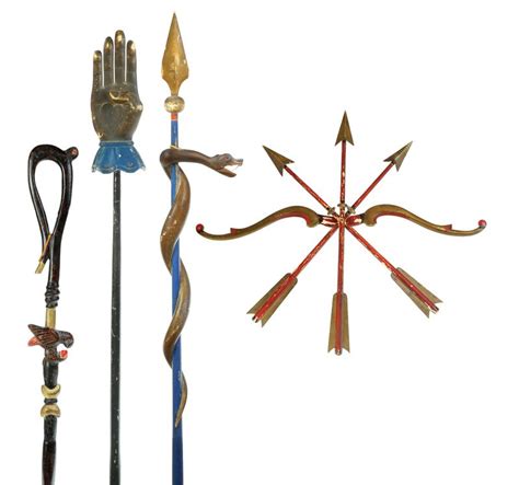 an assortment of decorative items displayed on a white background, including canes and poles