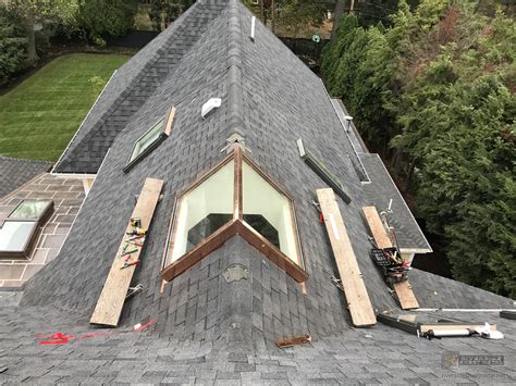 Custom made copper skylight on roof ridge - installation