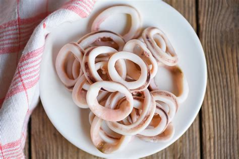 squid rings on white plate, Fresh squid cooked boiled with for food ...