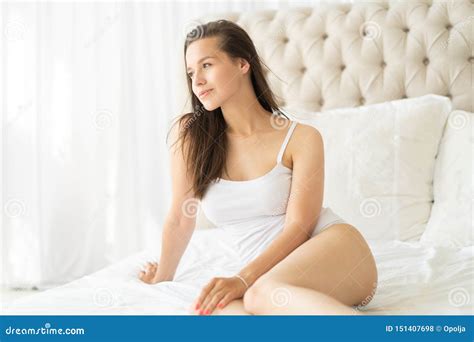 Lovely Woman Posing in a Bedroom Stock Photo - Image of elegant, face ...