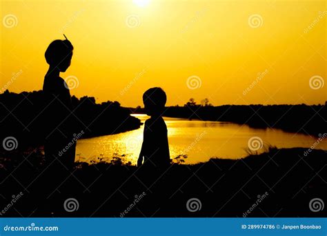 Silhouette of a Family Comprising a Father, Mother and Two Children ...