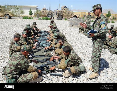 An Afghan National Army Regional Basic Warrior Training instructor ...