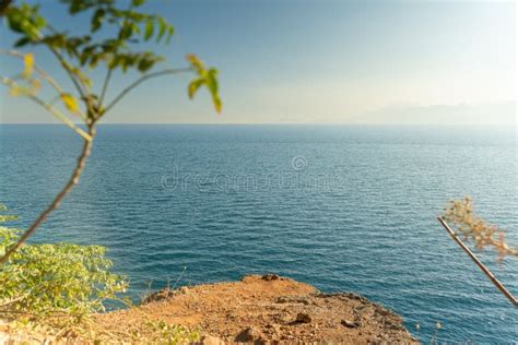 View of the Sea and Mountains Standing on the Edge of a Cliff. Sunset ...