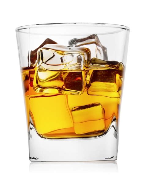 Premium Photo | Glass of whiskey with ice