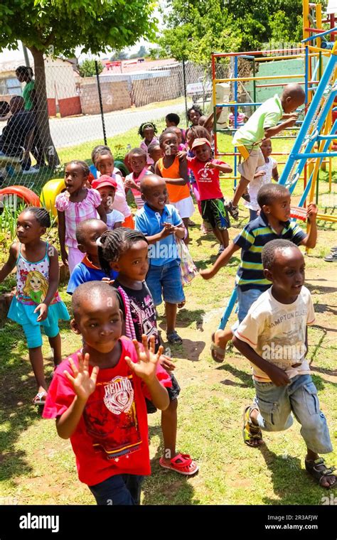 Young African Preschool kids playing in the playground of a kindergarten school Stock Photo - Alamy