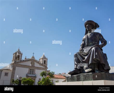 Statue of Prince Henry the Navigator looking out to sea in the square Praça Infante Dom Henrique ...