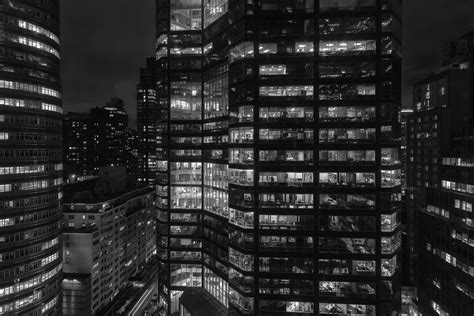 Buildings at night, close up view of office windows in skyscrapers, New ...