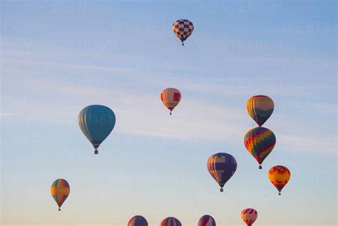 Hot air balloons flying in sky stock photo