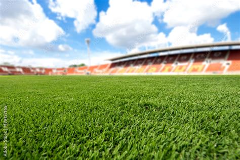 football field ball on green grass , soccer field background texture ...