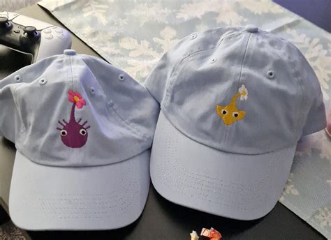 My partner and I unknowingly bought the same Pikmin hat for each other ...