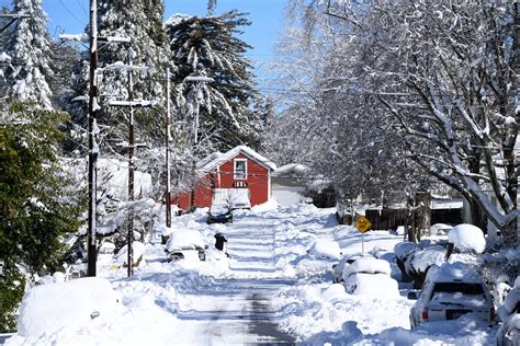 CA buried in snow as trapped residents brace for more winter storms