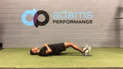 Eccentric hamstring bridges with Sliders - YouTube