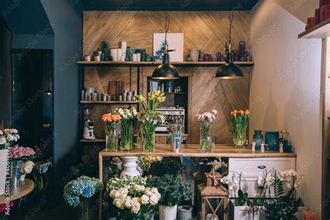 Small business. Flower shop interior. Floral design studio, decorations ...