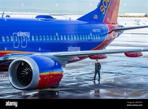 Denver, Colorado - A Southwest Airlines pilot performs a pre-flight ...