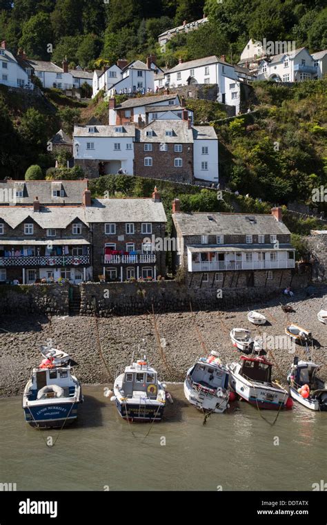 Boats in Clovelly Harbour Stock Photo - Alamy