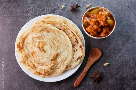 Chilly chicken with Kerala parathas porotta roti parotta barotta naan ...