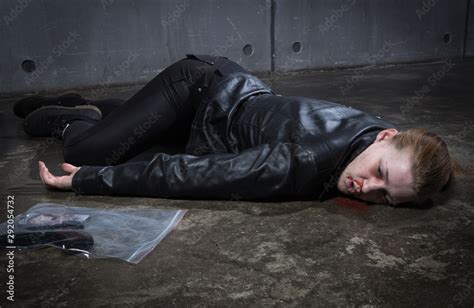 Crime scene imitation. Dead woman lying on a floor.. Stock Photo | Adobe Stock