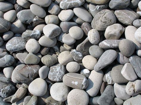 Sea Pebbles stock image. Image of rocky, surf, sunlight - 12981785