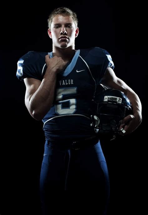 Dramatic lighting for portraits. | Football poses, Senior football ...