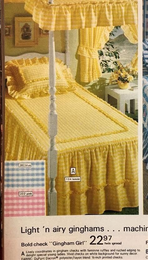 an advertisement for a bed with yellow ruffled bedspread and matching pillows on it