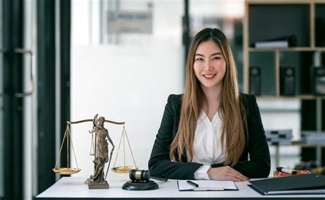 Premium Photo | Portrait of young female lawyer or attorney working in ...